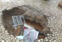 Buraco surge em calçada e quatro pessoas ficam feridas.